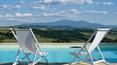 Toscana Immobiliare - 125-hectare property with three buildings, panoramic swimming pool, 2 hectares of garden and views of the Tuscan hills, for sale in Montalcino.